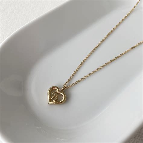 dior gold heart necklace